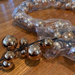 CB2 rose gold ball garland